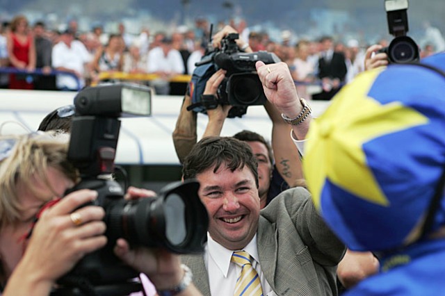 DEAN WATT caught in the Media Scrum